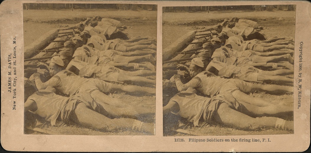 Filipino Soldiers in the firing line, P. I.